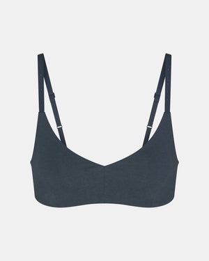 Front view of Women’s Essential Triangle Bralette in navy showing triangle cups and adjustable straps on light gray background