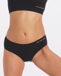 Torso and Waistline of Woman in Black Organic Natural Underwear and Bralette – PAKA Apparel