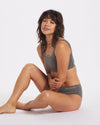 Model Sitting on Floor Wearing Forage Grey Women's Natural Alpaca Underwear and Bralette – PAKA Apparel