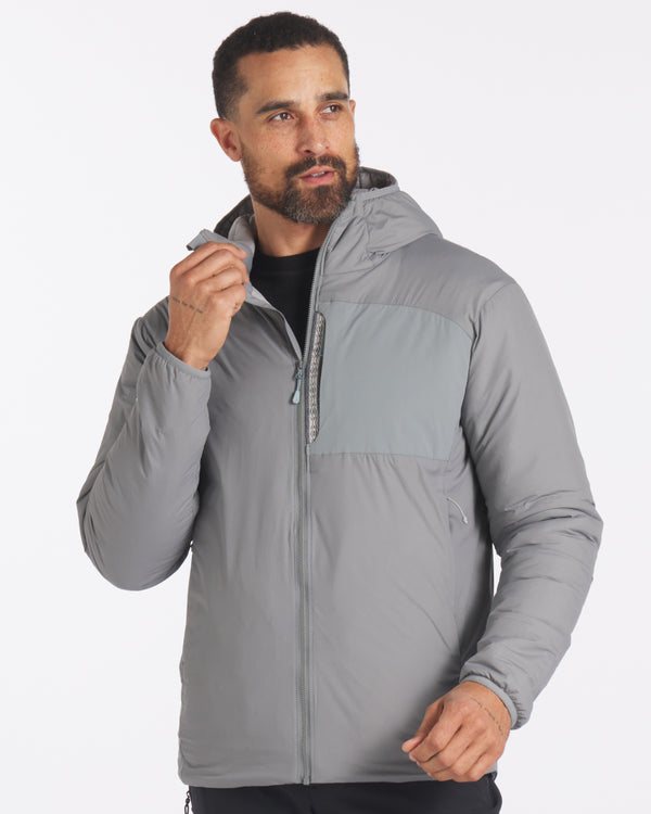 Model Wearing Apu Storm / Grey Men's Natural Lightweight Puffer Jacket with PAKAFILL® Alpaca Fiber Insulation – PAKA Apparel