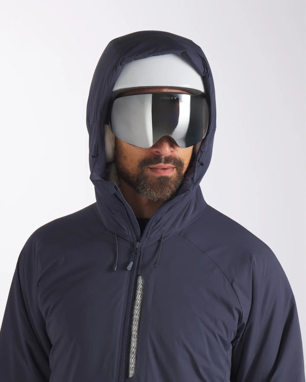 Model with Hood Up in Ski Helmet and Goggles Wearing Apu Navy Men's Parka Winter Jacket with PAKAFILL® Alpaca Insulation from Peru – PAKA Apparel