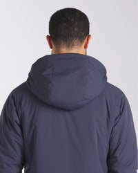 Back Shot of Man wearing Men's Apu Parka