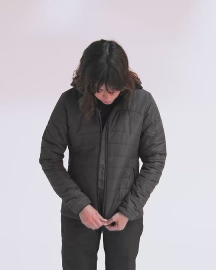 Video of woman in puffer jackets showing features