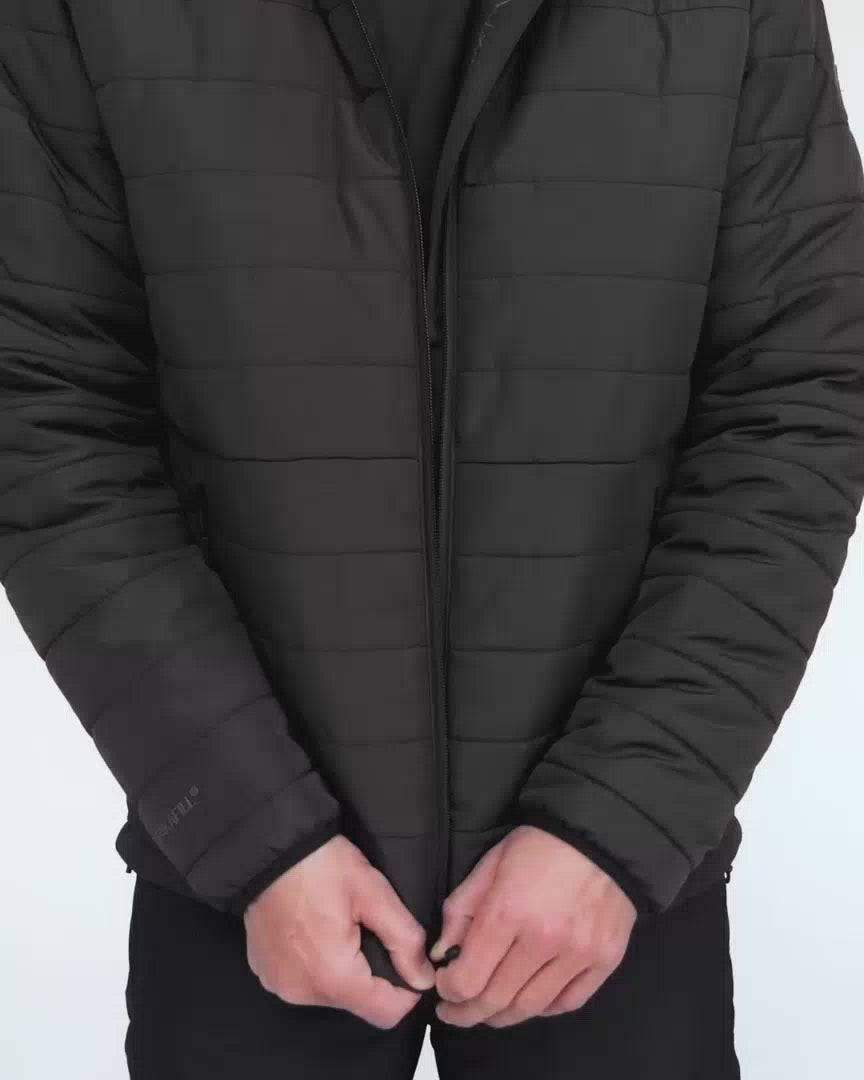 Man wearing paka puffer jackets in video showing features 