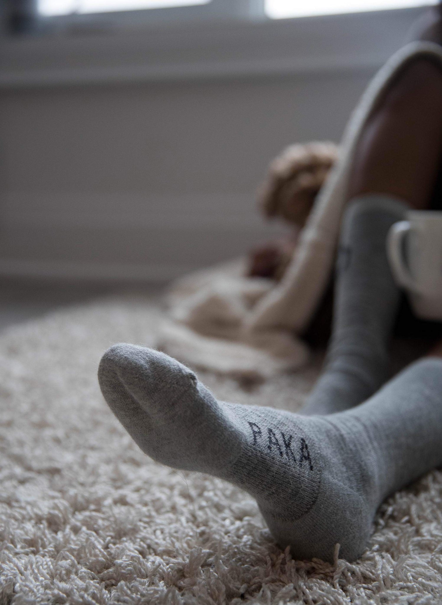 Alpaca socks on rug