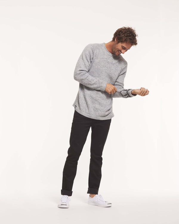 Timothy wearing the Men's Costa alpaca sweater by Paka Apparel