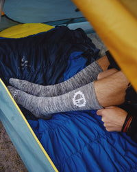 Spacedye grey alpaca socks with white logo