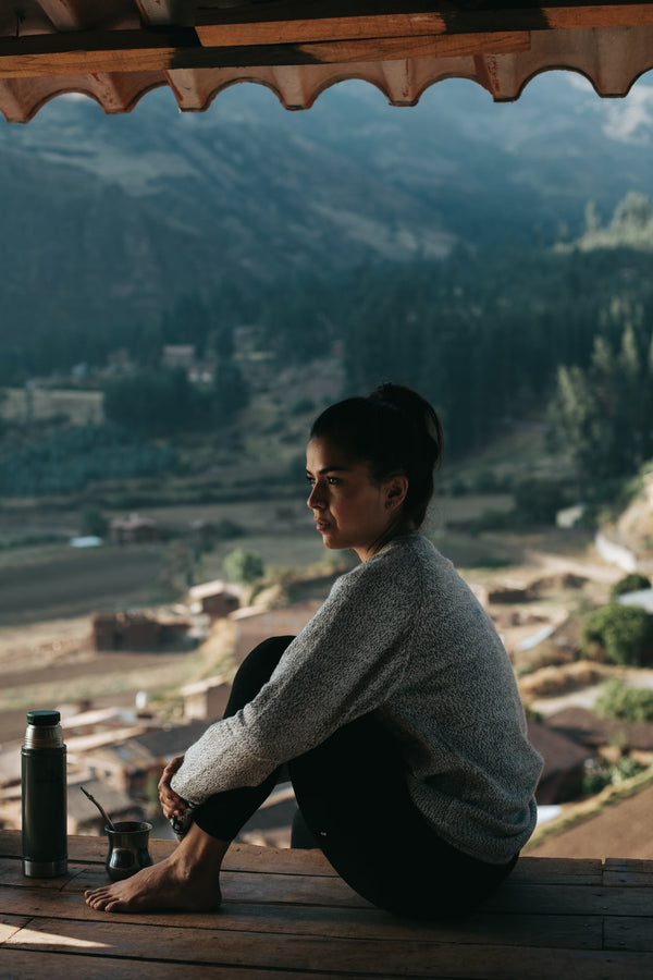 Woman Model in Pisac, Peru, wearing the Costa sweater by Paka Apparel