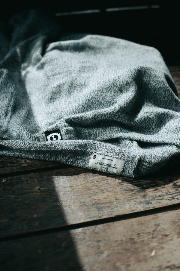 Hand-signed tag of Peruvian women weaver on the Costa