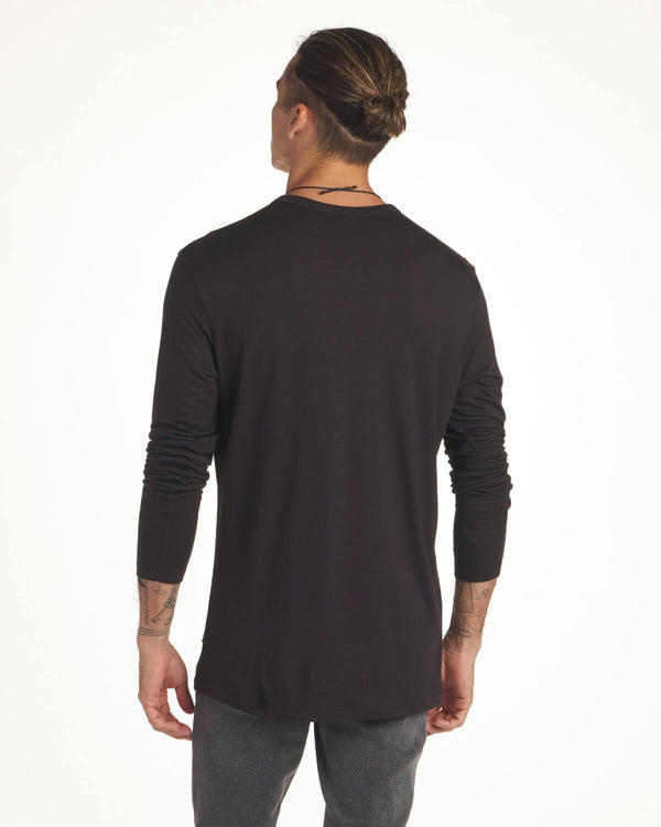 Back Shot of Model Wearing Black Aire Lightweight Men's Long Sleeve Shirt – PAKA Apparel