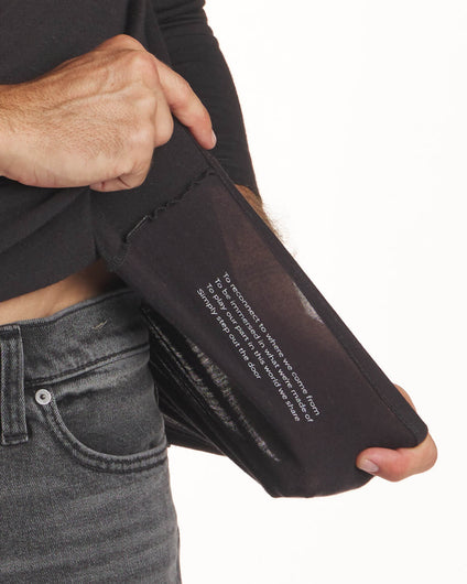 Close Up of Text on Underside of Black Aire Men's Alpaca and Tencel Long Sleeve Shirt – PAKA Apparel