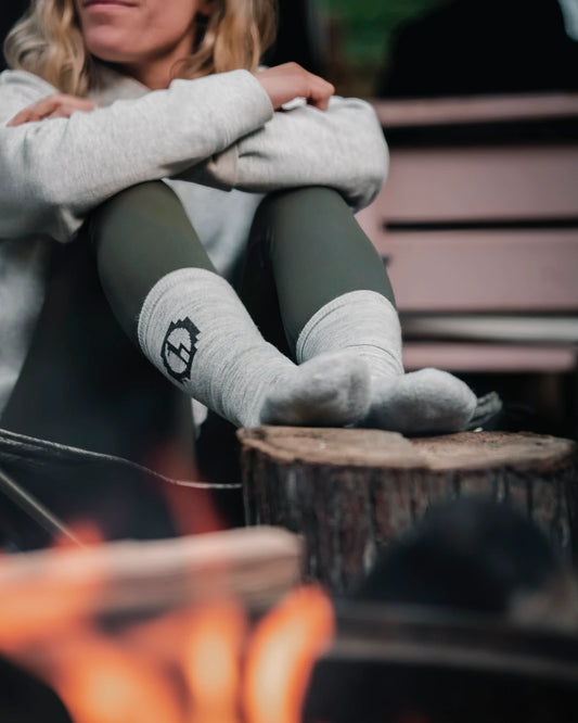 Light grey alpaca wool alpaca socks on model by bonfire