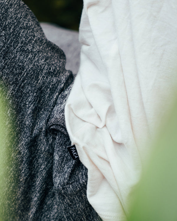 Close up of white Paka t-shirt