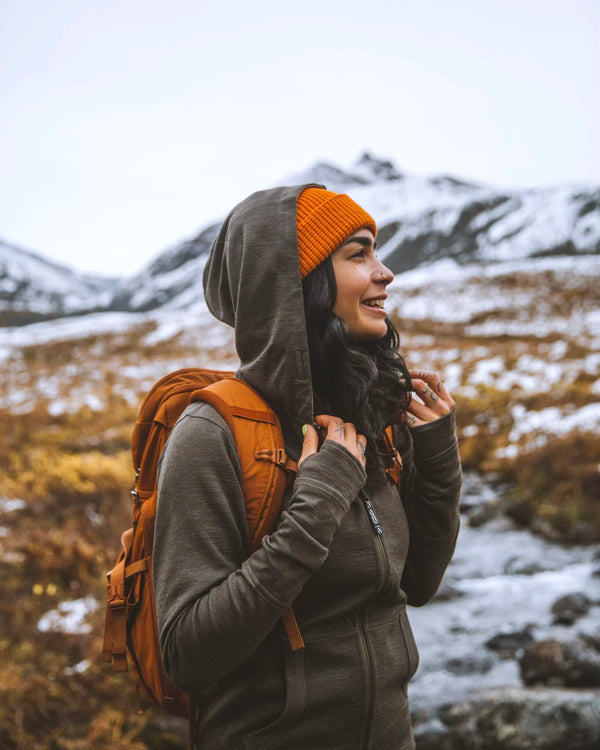 Woman wearing green alpaca wool hoodie 