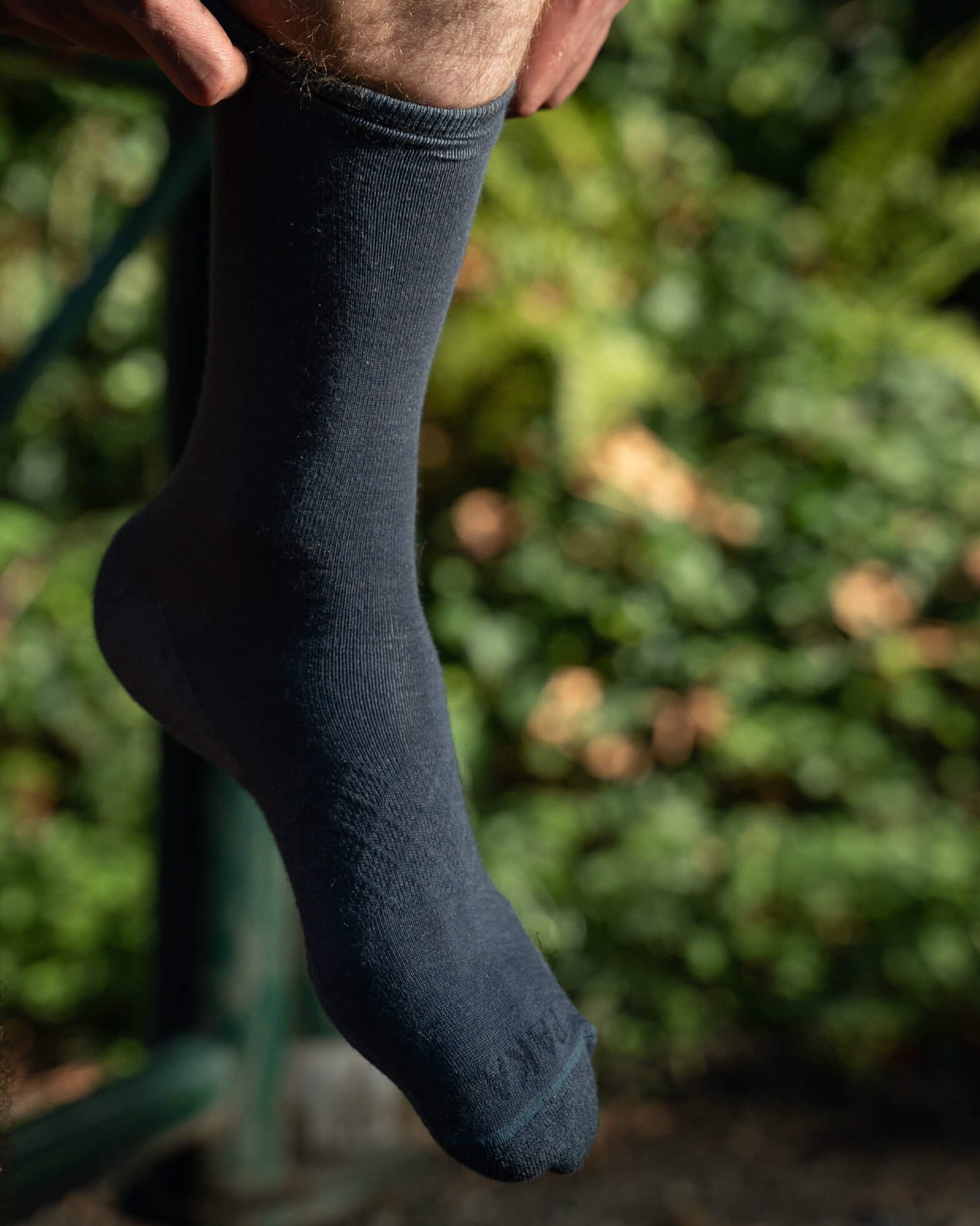 Blue alpaca wool alpaca socks on model 