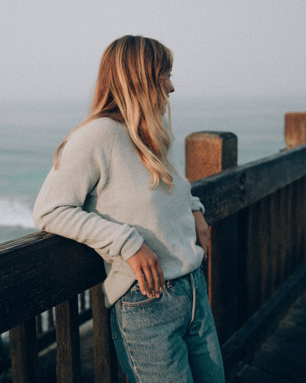 Woman Model in Sky Blue Crewneck by Paka Apparel